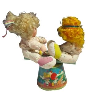 vintage jack and Jill girls on see- saw musical toy